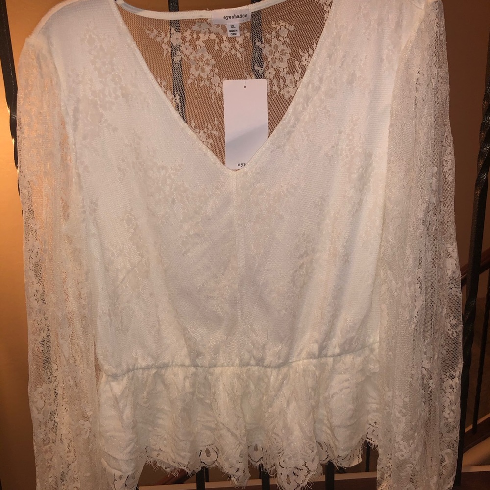 White peplum top